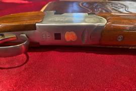 Weatherby Orion Sporting, 12-gauge                , Weatherby Orion Sporting
12-gauge              
Good condition                                             