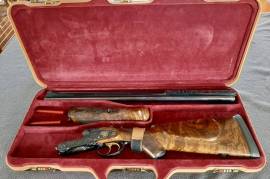 .470NE, .470NE Double, is in new condition it hasn't had 40 shots throw the barrels. This double is a cellectors item and is truly a masterpiece. The pictures don't do justice.
With gold ingraved, and Turkish wallnut shoulder piece, the total weight is just 6.4kg.
Case's and die included.
