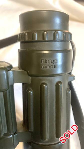 Carl Zeiss Dialyt 8x30B Green rubberized shell., This is a great pair of Carl Zeiss Dialyt 8x30B binoculars that feature independent eyepiece focusing and a rubber olive green armor coating. The rubber eyecups fold down to allow eyeglasses wearers to use the binoculars with ease. Marked 