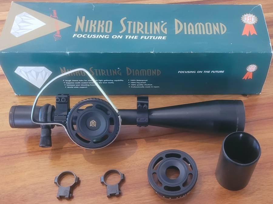 Nikko Stirling Diamond 10-5- x 60 MD, Sun shade, two focus wheels, fast focus grip, and scope mounts included.  Ideal for field target shooting