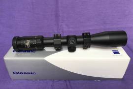 Zeiss Classic Diasport 2.5-10×42 T* rifle scope., Zeiss Classic Diasport 2.5-10×42 rifle scope.
This is identical to the Diavari Classic, but called a Diasport due to the special #67 reticle fitted.

Scope is light weight, of modern proportions/design and having the contemporary T* lens coatings. The scope is all matte finished alloy construction.
Turrets are the quick reset type, with 0.1 mil adjustments.
Tube Diameter 30mm.

The ideal light hunting rifle scope with GERMAN ZEISS OPTICS T*

Second hand scope , first owner.
Comes in original box with all factory documentations.
Scope mounts are incl.
Very good condition.
Please see photos.
No warranty , private sale !
Shipping at buyers cost and risk.