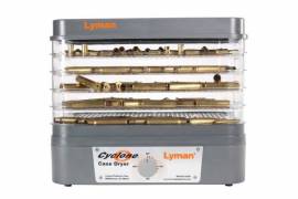 Lyman Cyclone Case Drier, Cyclone® Case Dryer
The perfect companion to any Ultrasonic or Rotary cleaning system. No longer will it be necessary to have to wait days for your brass to air dry! The forced heated air circulation of the Cyclone will dry your brass inside and out within an hour or two, with no unsightly water spots. The individual trays can keep your different caliber cases separate. Additionally, the dryer can also be used for gun parts that have been ultrasonically cleaned.
•    Holds up to 1000 – 223 cases or 2000 – 9mm cases
•    3 hour timer
•    Recessed handles on trays for easy loading and unloading
•    Fast drying time
•    Works with brass cases or gun parts
•    Durable and long-lasting ABS trays