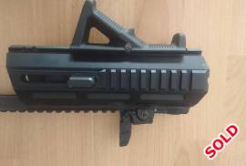 Triarii Carbine Conversion Kit Glock 19 Gen 4, This is the RTU version in black with comes with
* 6 Position Telescopic Stock;
* Magpul MBUS Front & Rear Sights; and
* Magpul AFG Grip