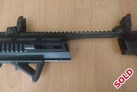Triarii Carbine Conversion Kit Glock 19 Gen 4, This is the RTU version in black with comes with
* 6 Position Telescopic Stock;
* Magpul MBUS Front & Rear Sights; and
* Magpul AFG Grip