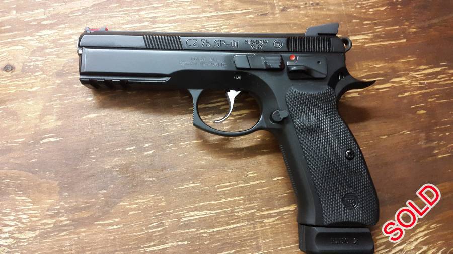 Cz 75 SP-01 shadow, 100 rounds down the barrel. Stil in case with all the original goods. like new