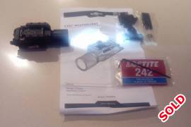 Surefire X300 LED light, Surefire X300 firearm Tactical LED white Light.

Still as new with box, accesories and all paperwork.

Scratch free.

Technical Information


Bulb: LED
Light Output: 170 lumens
Run Time: 2.4 hours
Battery: 2 - CR123A (included)
Material: Aluminum light with polymer mount
Length: 9.15cm
Weight: 108 Gram / 0.107kg
Color: Black


This light is actuated by an ambidextrous lever located on the rear of the housing; with the lever in the center position, the light is off.

When the operator moves the lever either up or down, the switch is activated and the light comes on.
