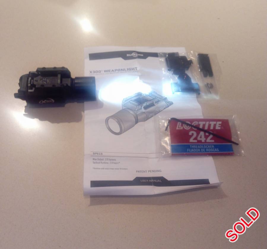 Surefire X300 LED light, Surefire X300 firearm Tactical LED white Light.

Still as new with box, accesories and all paperwork.

Scratch free.

Technical Information


Bulb: LED
Light Output: 170 lumens
Run Time: 2.4 hours
Battery: 2 - CR123A (included)
Material: Aluminum light with polymer mount
Length: 9.15cm
Weight: 108 Gram / 0.107kg
Color: Black


This light is actuated by an ambidextrous lever located on the rear of the housing; with the lever in the center position, the light is off.

When the operator moves the lever either up or down, the switch is activated and the light comes on.
