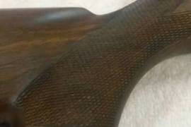 SAKO .22 Long Rifle, Complete with TASCO 10x40 scope, oil stock, silencer, perfect condition