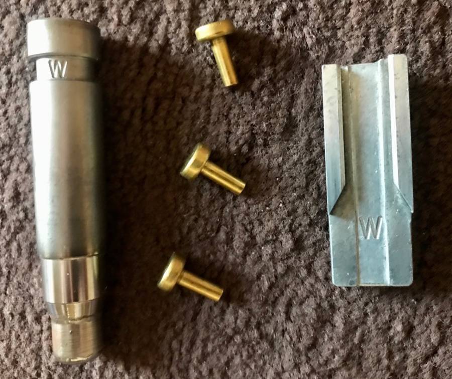 Items for Dillon XL650/750 caliber conversion, 1 X .40 caliber position 1 shell ramp
1 X .40 caliber powder funnel for Dillon powder measure
3 X .40 caliber brass locator pins for shell plate