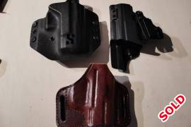 CZ PO7 Gen 2, CZ P07 Gen 2- Including: 1 (One) IWB holster, 1 (One) OWB holster; 1 (One) Leather holster, 1 (One) Tekmat Cleaning Schematic Mat; Original Cary Case that includes 2 (Two) single stack mag adaptors, Extra Magazine, Grip Adjustments, Cleaning Rods and Original Paper Work. Fired around 300-400 rounds, and a year old since purchased new at Wildman. Open to reasonable offers.