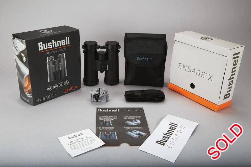 Bushnell Engage X 10x42 Binoculars, new!, The Engage X 10x42mm Binoculars deliver quality glass in a lightweight package. The fully multi-coated optics provide you with a brighter and clearer image at dusk and dawn when you need it most. These binoculars are IPX7 waterproof rated, and have Bushnell’s exclusive molecularly bonded EXO Barrier™ for a clear image no matter the weather. An adjustable diopter ensures that these binoculars are fully adjustable to meet your eyes needs.The ultra-smooth focus wheel allows you to focus in on an object quickly for perfect definition. Buy with confidence -it’s all protected by our full lifetime Ironclad Warranty.