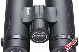 Bushnell Engage X 10x42 Binoculars, new!, The Engage X 10x42mm Binoculars deliver quality glass in a lightweight package. The fully multi-coated optics provide you with a brighter and clearer image at dusk and dawn when you need it most. These binoculars are IPX7 waterproof rated, and have Bushnell’s exclusive molecularly bonded EXO Barrier™ for a clear image no matter the weather. An adjustable diopter ensures that these binoculars are fully adjustable to meet your eyes needs.The ultra-smooth focus wheel allows you to focus in on an object quickly for perfect definition. Buy with confidence -it’s all protected by our full lifetime Ironclad Warranty.