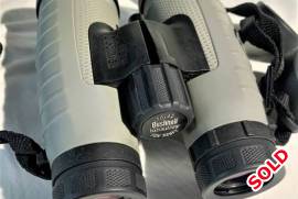 Bushnell 10x42 NatureView Roof Binocular, he 10x42 NatureView Roof Binocular from Bushnell has a lead-free optical path that is fully multicoated for enhanced contrast and image clarity. This model of the NatureView series binocular uses a roof prism design, which enables a more streamlined form factor compared to Porro prism designs. The binocular weighs less than 1.5 lbs and features a rubber-armored weather-sealed housing, making it well-suited for day hikes and other recreational activities. Twist-up eyecups and 15mm eye relief permit a comfortable viewing distance even while wearing eyeglasses. A 62° apparent viewing angle provides immersive views, making the 10x42 NatureView a well-equipped binocular for almost any mid-range observation.