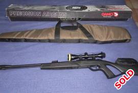 Gamo CFR fixed barrel springer with scope, etc., .177 Gamo CFR air gun with adjustable trigger for creep
Gamo Sporter AO 4X32 duplex scope
Includes rifle bag
Have original box it came with
Used it for field target shooting, won 2 gold medals, hence adjusted cheekpiece (the modification is removable)
Can courier it to you within South Africa with Courier Guy for free or at a reduced price depending how far you are from Cape Town