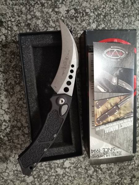 Microtech autohawk, 2019 sees the rebirth of the classic Hawk push-button automatic knife. Originally released in 1996, this knife revisits the classic folder with updated aesthetic features redesigned for a sleeker finish and increased functionality. Streamlined Karambit blade and automatic firing mechanism make for a sturdy and modernized take on this iconic piece. Excellent ergonomics, a carbide glass breaker, and jimping right where you need it are readily apparent at first sight. But, it's the incredible design of the spine, tight tolerances, and industry-leading action that you can't see that make all the difference. This knife is simply amazing.