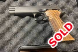 SIG Sauer P210, Selling an as new in box P210 , 50 rounds fired, as new in box. The reputation of this pistol is true, one if the most accurate pistols in 9mm ever made! Two magazines. In dealer Stock. No silly offers. Stock of these in SA is not currently available. 