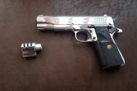 Norinco .45ACP , Excellent weapon ,as many are aware she'll is much stronger than other 1911 comes with a detachable comp