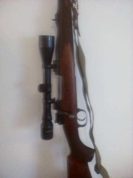 Musgrave 30-06 mauser action, Musgrave K98 Lightweight bolt action with Mauser action. Tasco 4x40 telescope. Rifle belt. Magazine capacity 5 rounds. Includes dies, powder, bullet heads, cases and RCBS balance scale.
