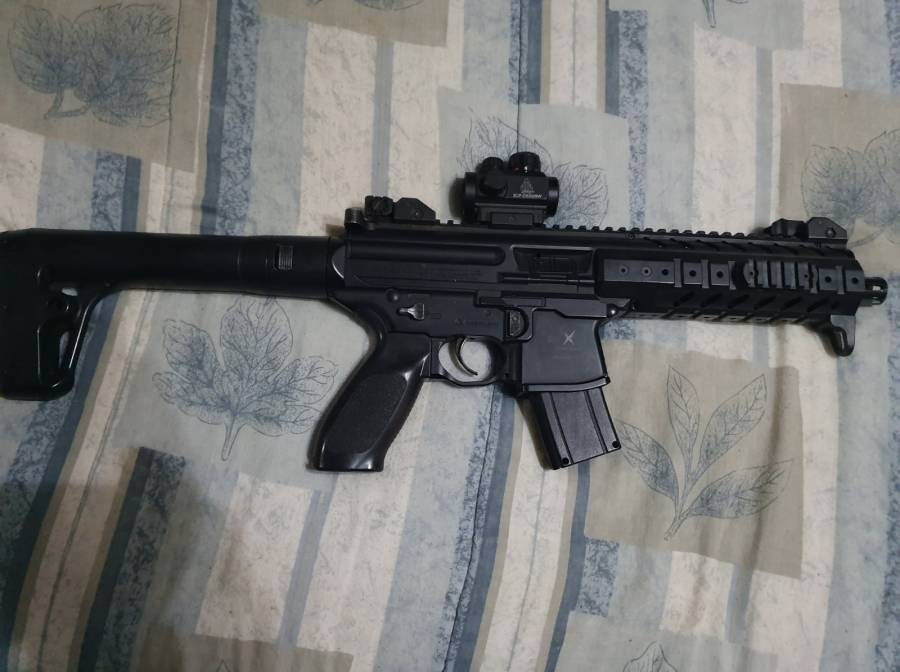Sig Sauer MPX CO2 .177, MPX CO2 air rifle.  30 shot mag.  Optics.  CO2 cannisters incl.