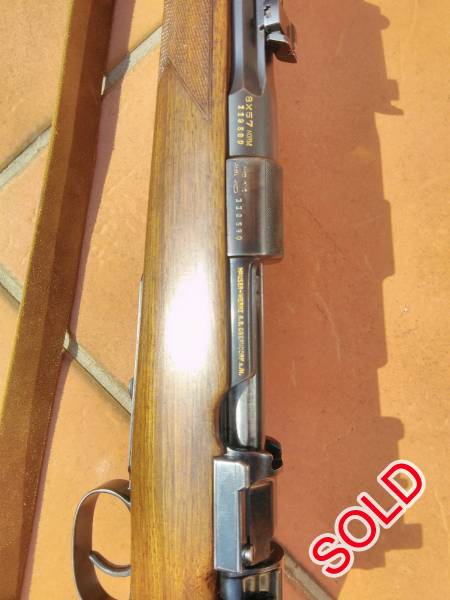 Type L in B configuration Afrika model mauser, In original caliber 8x57j an example of Mauser perfection. Smooth bolt action with an octagonal top ribbed barrel. 
 