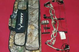 New Hoyt Carbon Defiant , Hoyt Carbon Defiant with QAD Fallaway rest, Shorty Arrow Rack, Fuse Sight, & CASE.  Bow and all accessories are New without original packaging.

 