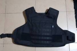 Ceramic Plated Bulletproof Vest., Selling my size XL Ceramic Plated Kevla Bulletproof Vest. Has adjustable straps and 2 ceramic plates (Front and Back).

Please Contact if interested.