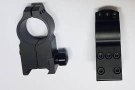 Warne 1 inch tactical extra high MSR rings, made for modern sporting rifles like the Ar15, allows hand to go under the scope to cock the rifle