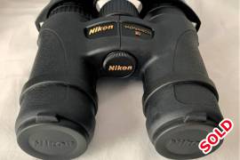 Nikon Monarch 7 Binoculars in box. New price R7849, The photos are of the actual binoculars, as you can see as new and never been outdoors.

The Nikon Monarch 7 8x30 Binoculars. Nikon’s new MONARCH 7 binoculars suit all outdoor activities from hunting expeditions to nature walks. The sophisticated all-new compact design weighs less than 500 g, making the MONARCH 7 the lightest in its class of high performance binoculars. Equally impressive are the superior optics and wide field of view.

This compact, high performer is rugged and reliable too. Waterproof and fog-free, it features a protective rubber armouring for shock resistance and a firm, comfortable grip. The long eye relief, turn-and-slide eyecups, and soft neck strap make it comfortable to carry and use.

