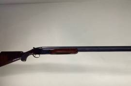 MIROKU 12 GAUGE O/U 12  SHOTGUN, Japanese manufactured 12 gauge 28” barrels, chokes are full and ¾. This is suitable for Trap Shooting. The shotgun is in very good condition, and the action is extremely tight. The shotgun comes in a lockable plastic case and a set of snap caps.
