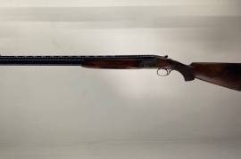 FRANCHI 12 GAUGE O/U SHOTGUN, Italian manufactured 12 gauge 26” barrels, chokes are 3/4 and 3/4. This is suitable for Trap Shooting. The shotgun is in very good condition, and the action is tight.
