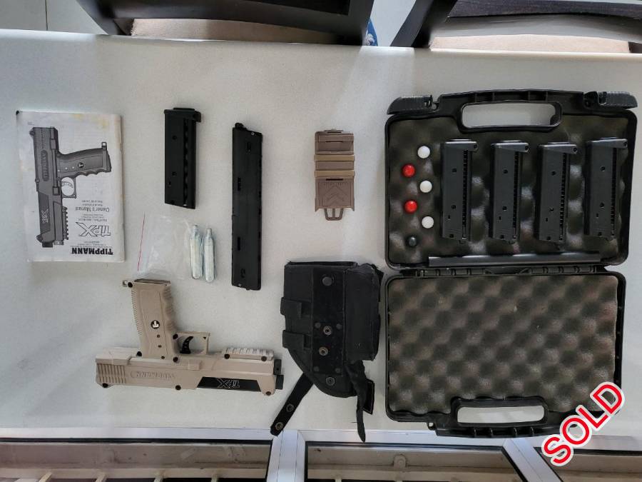 TipX bundle with loads of extras , Come with 5 mags and a zeta mag plus holster and extra CO2 canisters. Only test fired and used as self defence next to the bed. 