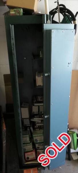 3 Rifle Safe, 3 Rifle Safe, 3 Rifle Safe , two storage brackets  on inside wall .   two keys. R2500-00 Collect Bellville - Western Cape . Contents not included .
