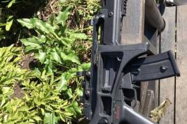 WE G36c AEG Airsoft rifle+accessories, A lightly used WE G36c, includes one high capacity magazine, two medium capacity magazines, a sling, red dot sight, battery and charger. No box. 