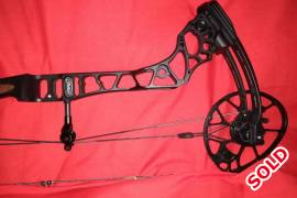 Mathews Triax Bare Bow, Mathews Triax bare bow in like new condition  ...
70 lbs  and 29 