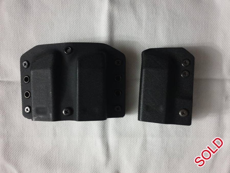 Daniels double and single mag holsters Sig Sauer , 1 x SIingle iwb mag hoster 
1 x Double owb mag holster 
For a full size Sig Sauer P250/320 mags 
Excl. Postage fee 