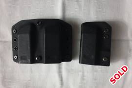 Daniels double and single mag holsters Sig Sauer , 1 x SIingle iwb mag hoster 
1 x Double owb mag holster 
For a full size Sig Sauer P250/320 mags 
Excl. Postage fee 