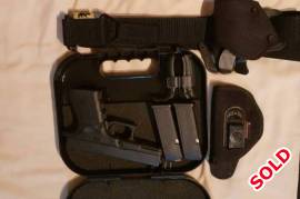 Glock 19 gen 4 and extras, Glock 19 gen 4, only a couple hundred rounds fired.
2 standard magazines with case and grips.

IWB swiss tactical nylon holster
OWB blackhawk grip release tactical holster with sniper tac belt.

Immigrating soon so need to sell.