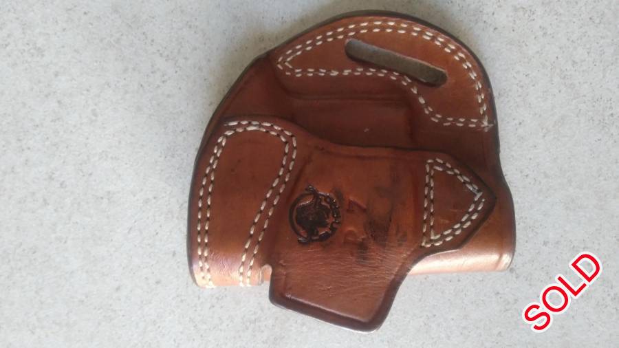 Holster & magazines, 2 x custom leather holsters for sale @R400 each.
 