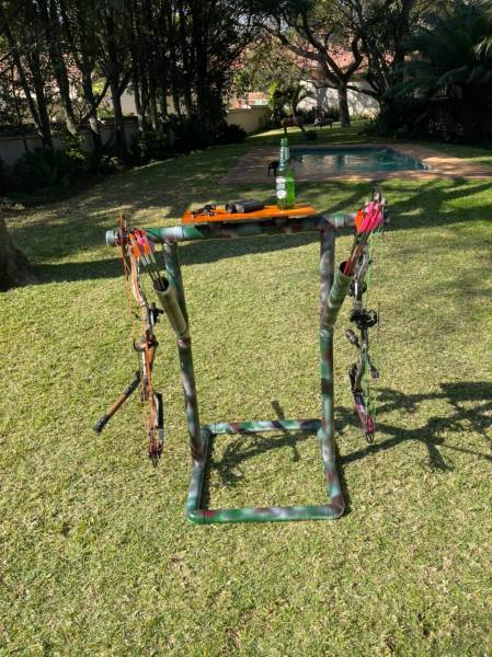 Bow and arrow stand, A bow stand for two people and a table for extra equipment 