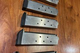 COLT 45 Stainless steal Magazines, 5 stainless steel .45 Cold magazines with rubber boot available, perfect for combat shooting. 7 round capacity and in very good working condition. R2400-00 for all 5. R495-00 per magazine.