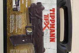 Tippmann TiPX + Olight, Tippmann TiPX paintball pistol with 2 magazines, spare CO2 cartidges, solid black and pepper balls. Never Fired.
Also, Olight PL-Mini2 600 Lumen, 100metre throw, fits to picatinny rail