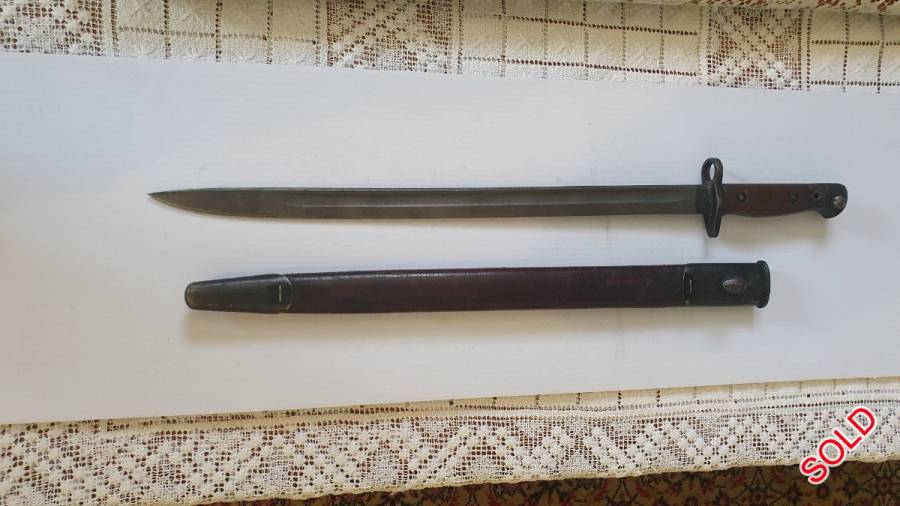 1907 Wilkinson Bayonet, 1907 Wilkinson Bayonet and sheath that was in the family for many many years and kept in safe all this time. Condition is used but good for it's age and are looking to sell to any collector. As far as we know it fits a 303 Rifle and hoping a collector can pair it together. We selling as we believe it would be more valuable in the hands of a collector or enthusiast.

Price is negotiable or will accept highest offer.