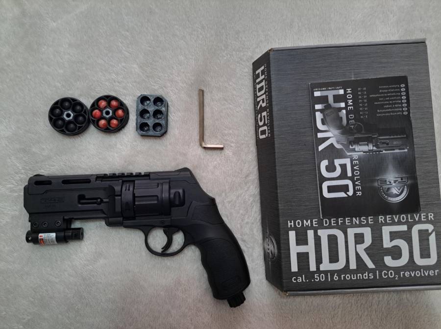Umarex HDR50 with Laser sight, Brand new with accessories 
- Laser Sight
- 3 x Magazines 
- 6 bullet mould 
- Comes with Pepperballs, Nylon Balls & Co2 canister 