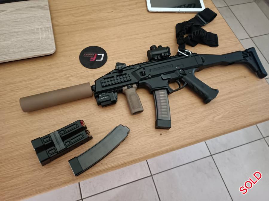 Cz Scorpion Evo 3 9mm , Selling my CZ Scorpion Evo 3 as per Photo
2x 20 round mags 
2 X 30 round mags
Silencer done by motion silencers
UTG red dot sight 
Undermount gun light
Gun is les than 3 months old
WhatsApp me for response 