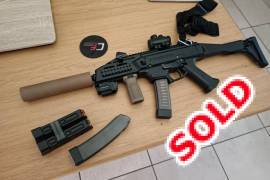 Cz Scorpion Evo 3 9mm , Selling my CZ Scorpion Evo 3 as per Photo
2x 20 round mags 
2 X 30 round mags
Silencer done by motion silencers
UTG red dot sight 
Undermount gun light
Gun is les than 3 months old
WhatsApp me for response 