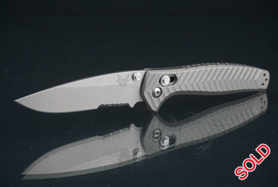 Benchmade 781S Anthem AXIS Lock Folding Knife Bron, The knife is in mint unused condition has had some pocket time but not much

comes with it's benchmade pouch only

The first integral handle knife from benchmade and the action is amazingly smooth
