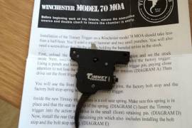 Timney Trigger for new Winchester model 70 (MOA), Brand new Timney trigger replacement for Winchester Model 70 with MOA trigger. You can easily replace the trigger yourself. Trigger is brand new - was fitted and removed (I preferred the trigger job my gunsmith did on original)