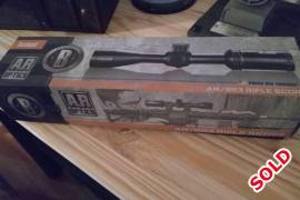 Bushnell AR 3-12x40 + Mount, Brand new in box, unwanted gift. Bushnell AR scope and Rudolph mount.