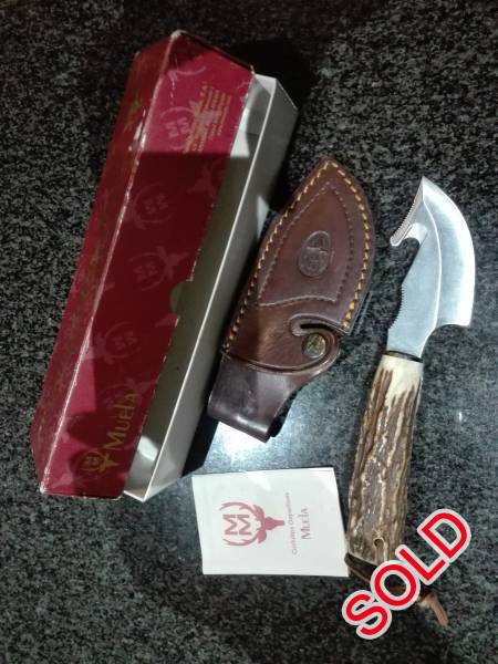 Muela Raccoon, Muela Raccoon with ivory handle. Comes with leather pouch & box. Hardly used & in good condition. R800-00 neg Mo-0726178680
