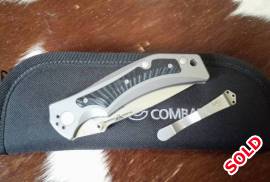 Wilson Combat Rapid Response XL Elmax, The knife is in excellent condition and has had some modifications done, ZT deep carry pocket clip installed to allow for tip up carry and a flipper tab delete. Comes with carry case and original clip.

Collect in cape town or I can ship via postnet for R99

Please contact me via email first or whats app

https://shopwilsoncombat.com/Rapid-Response-XL-ELMAX-Stonewash-Cocobolo-Inlay/productinfo/WTK-RRX-SC/
